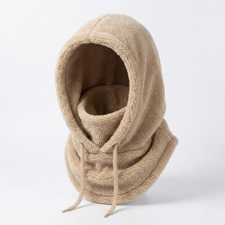 Beige plush hooded neck warmer with drawstrings and face covering isolated on a white background.