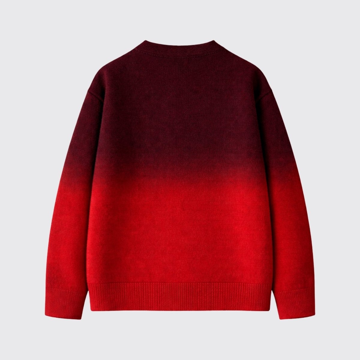 Flat lay back view of men's burgundy and red gradient knit sweater showing seamless color transition and ribbed hem details.