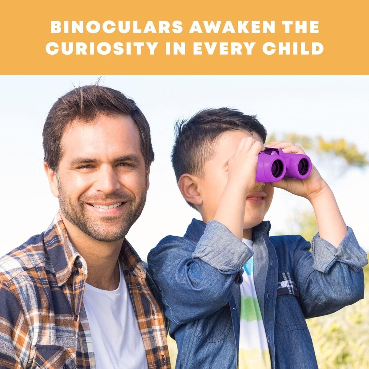 A father and son bird watching together outdoors using purple binoculars to awaken childhood curiosity and STEM learning.