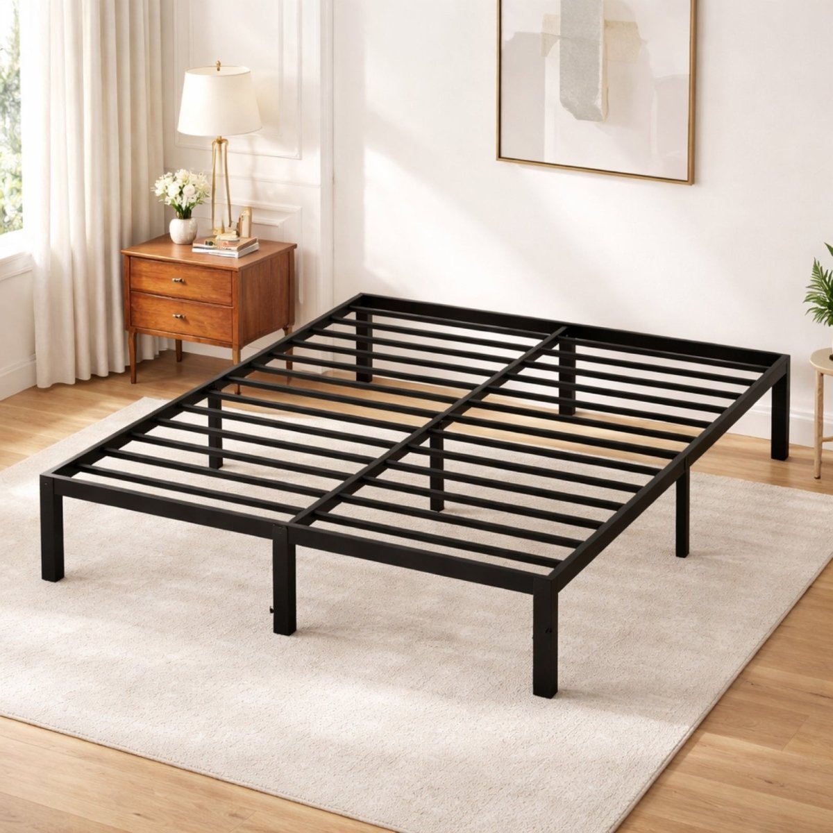 Angled view of empty black metal bed frame highlighting reinforced legs and noise-free steel construction.
