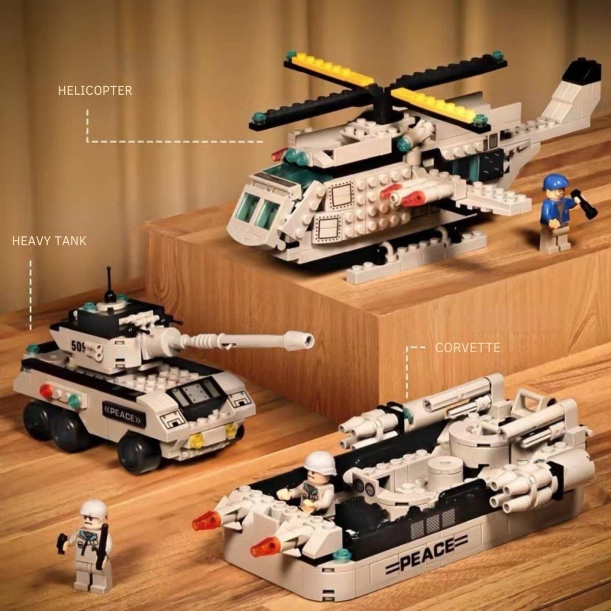 Detailed view of the individual models from the Kouvr construction set, including the heavy tank, helicopter, and corvette with minifigures.