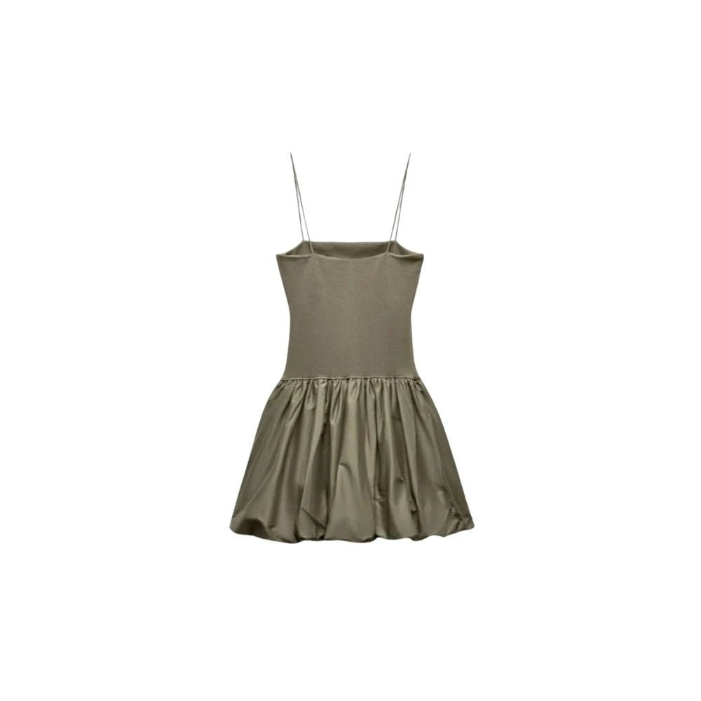 Green kouvr dress with thin straps on a white background