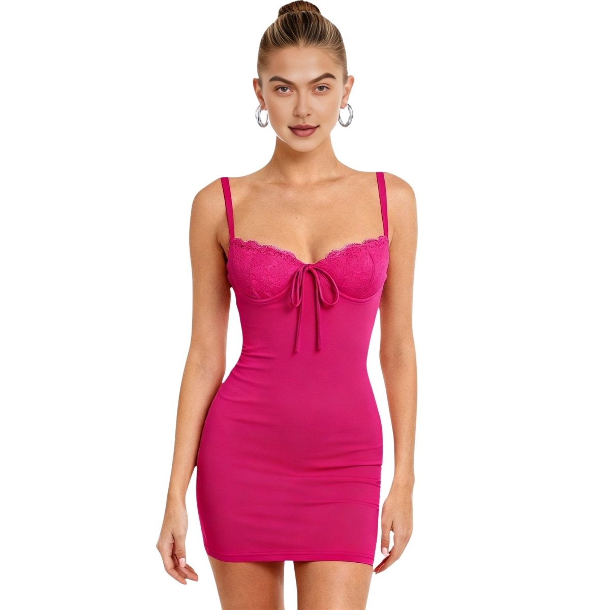 Woman wearing a rose red dress with thin straps on a white background