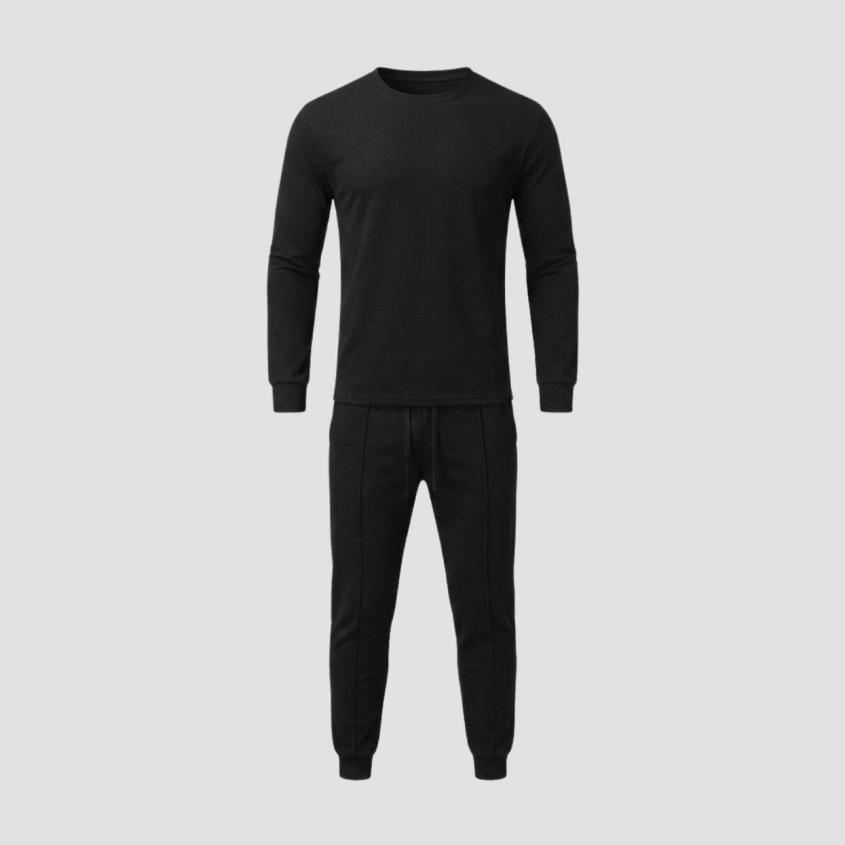 Flatlay of the Kouvr Crue men's black tracksuit set, showing the front of the long-sleeve crewneck and drawstring joggers.