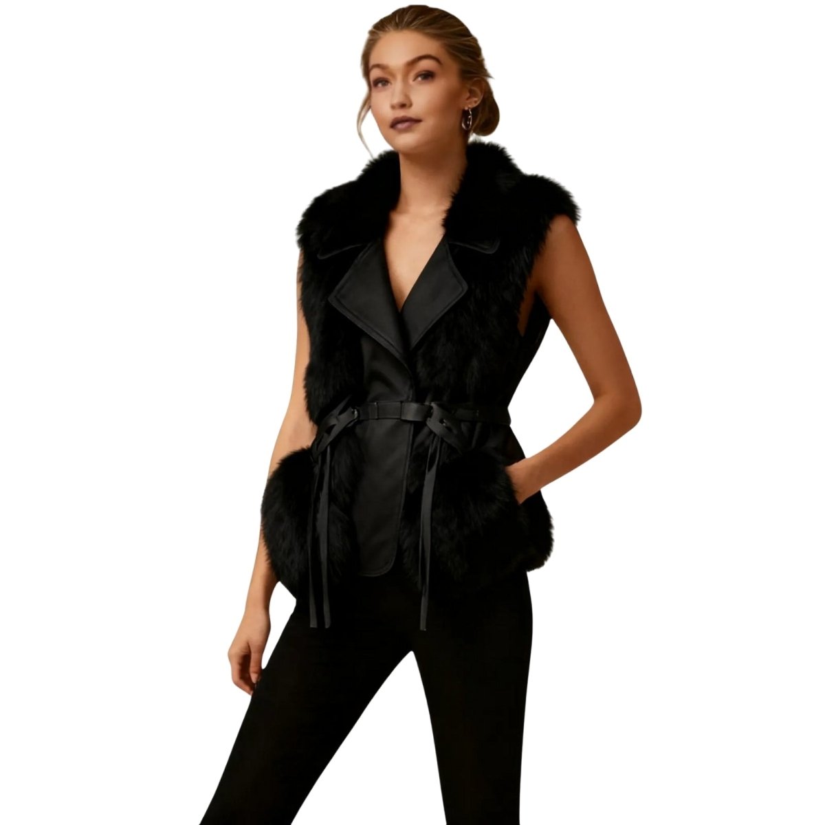 Woman wearing a black Kouvr fur vest and black pants on a white background