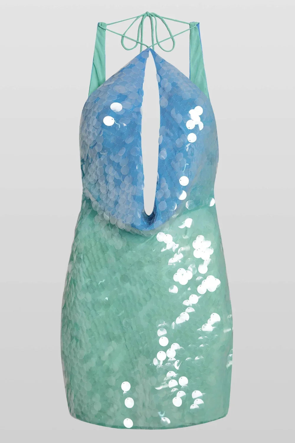 Model wearing Kouvr Fashion's Amber Ombre sequin halter mini dress with a deep keyhole cutout in blue