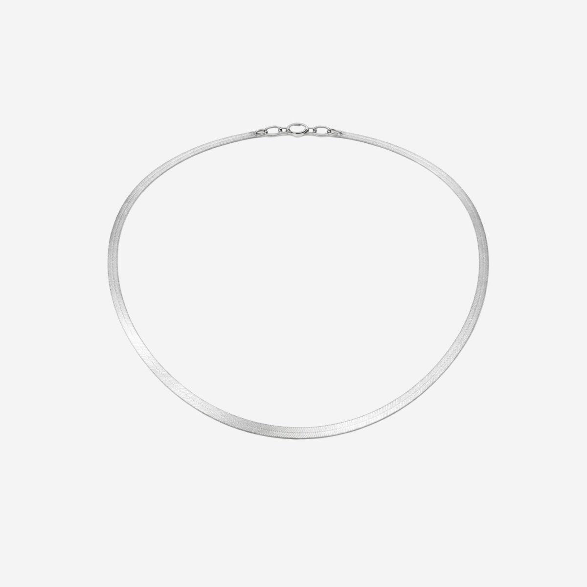 The Amelie Silver Snake Chain Necklace by Kouvr Fashion, a flat herringbone choker with 18k gold plating, shown on a white background.