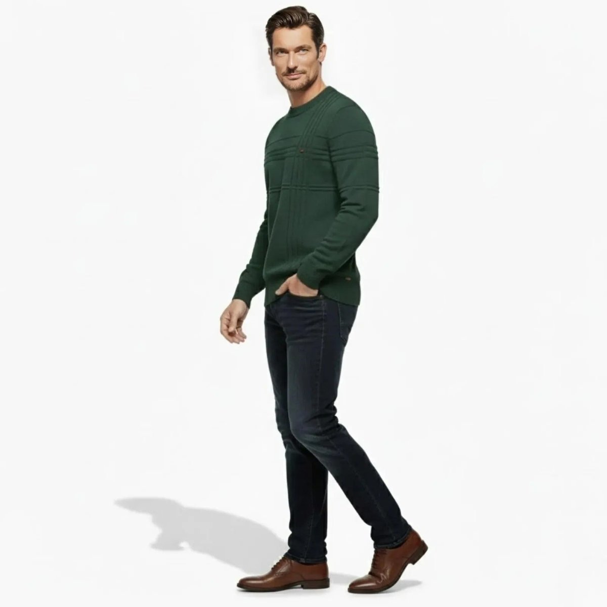Male model in a side profile view walking, wearing the Kouvr Fashion forest green textured sweater, showcasing the slim fit and sleeve detailing.