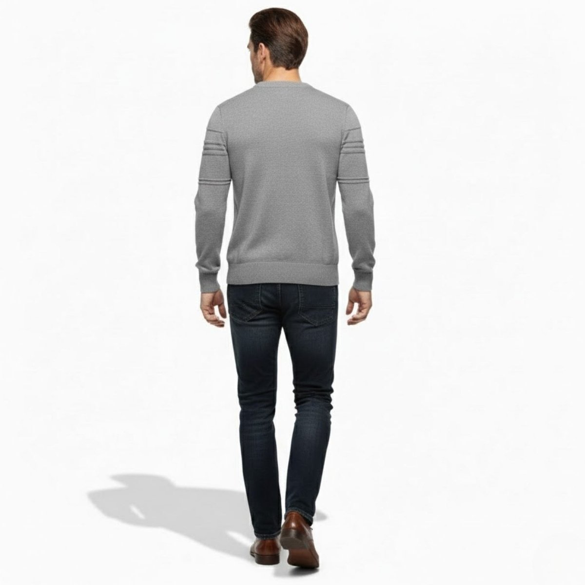 Back view of a man in a slim fit Kouvr Fashion heather grey knit pullover, showcasing the sweater's fit and sleeve details.