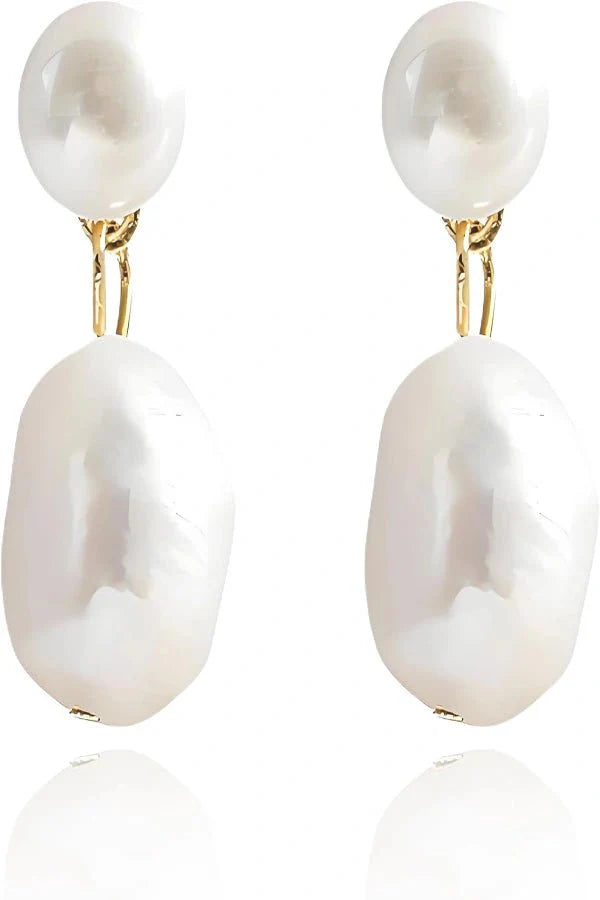 Pair of pearl Kouvr earrings with gold accents on a white background