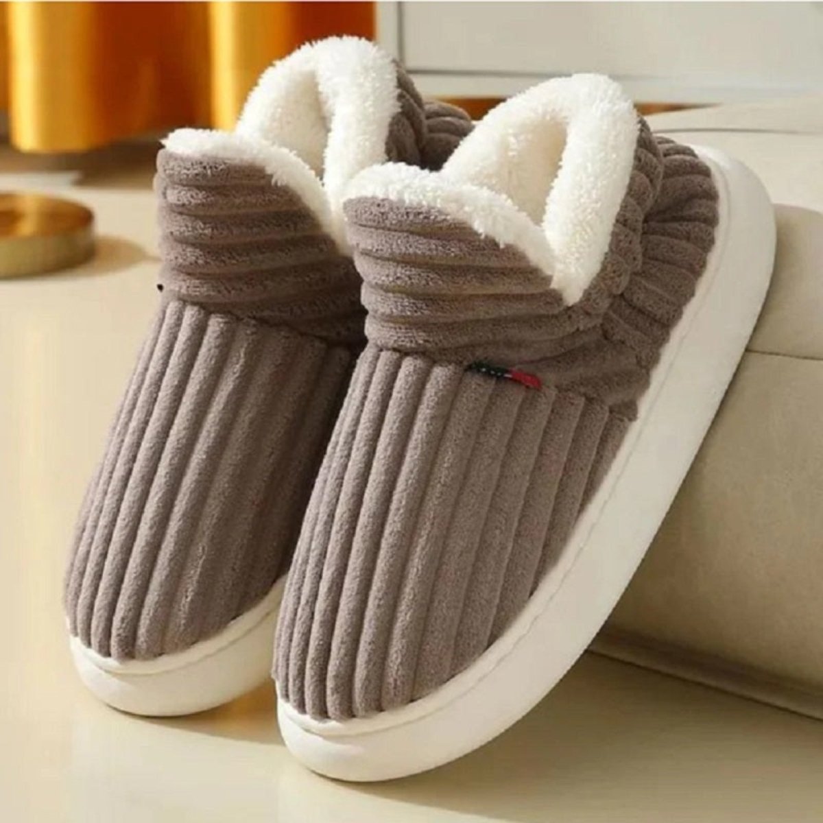 A pair of Brown Jasmine corduroy slipper boots by Kouvr Fashion, highlighting the wide-wale texture and plush sherpa collar.
