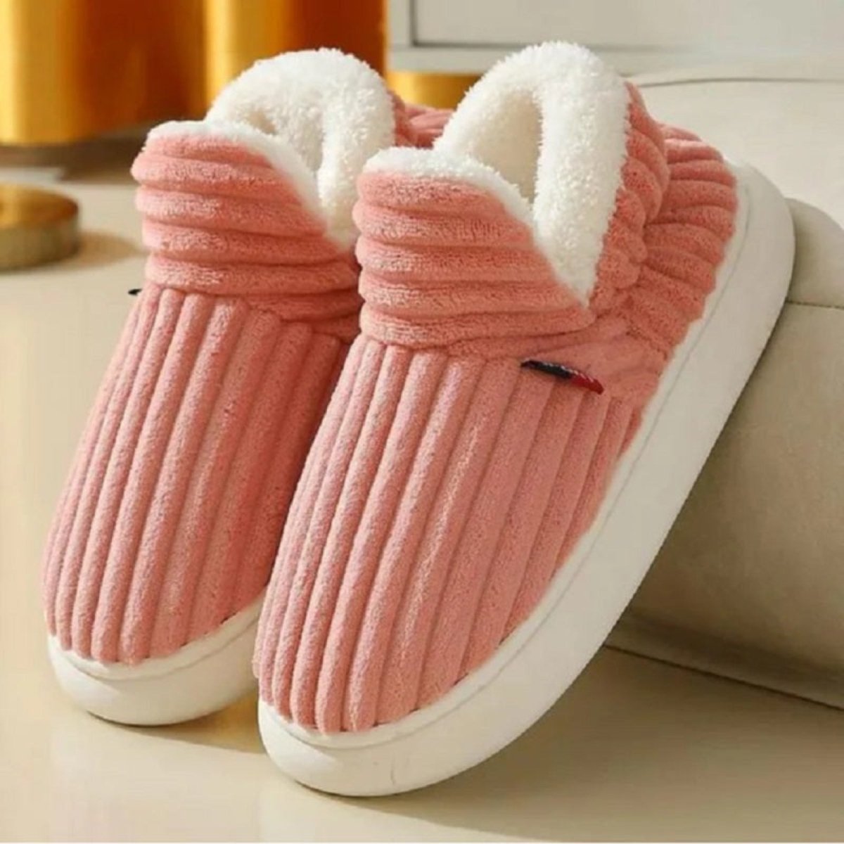 A close-up view showing the thick, soft, and warm white sherpa fleece lining inside the Kouvr Fashion Jasmine corduroy slipper boot.