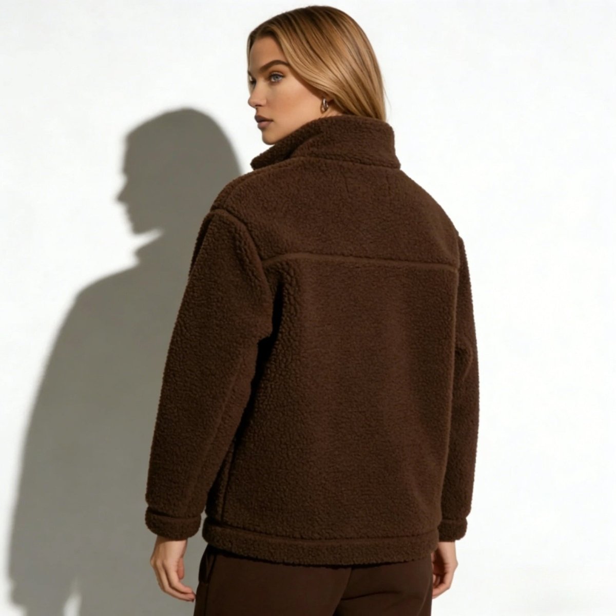 Back view of a model in the Kouvr Fashion Julie Sherpa Fleece Jacket, highlighting the reinforced yoke seam and clean construction.