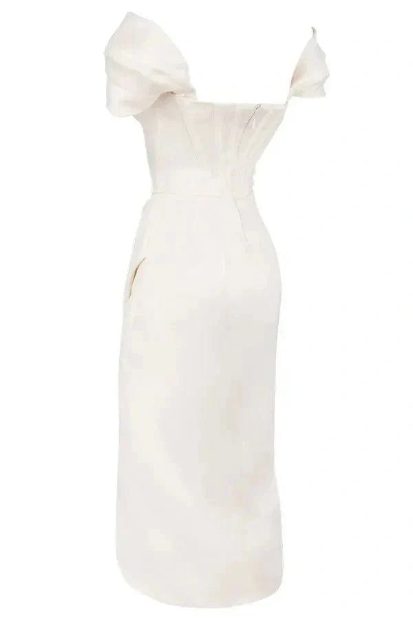 structured bodice, asymmetrical hemline, sweetheart neckline, sculpted silhouette, boning, and figure-flattering