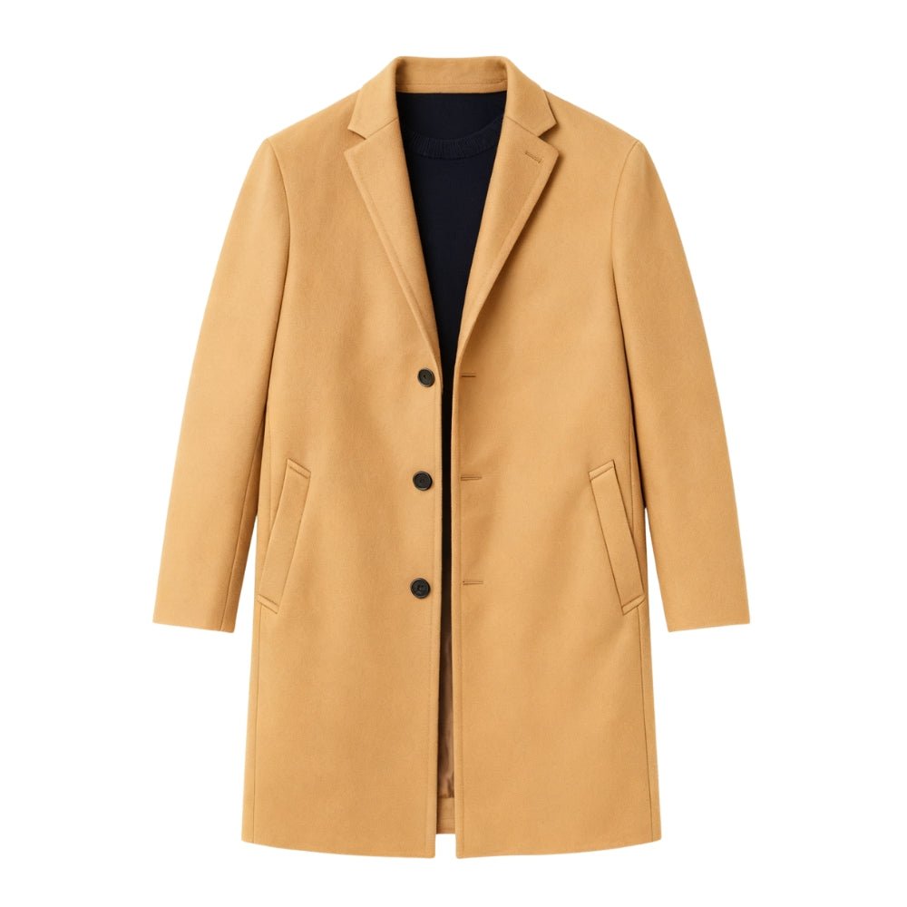Tan Kouvr coat with black buttons on a white background
