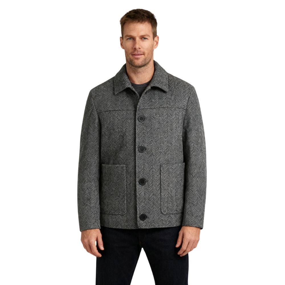 Man wearing a gray kouvr textured jacket on a white background