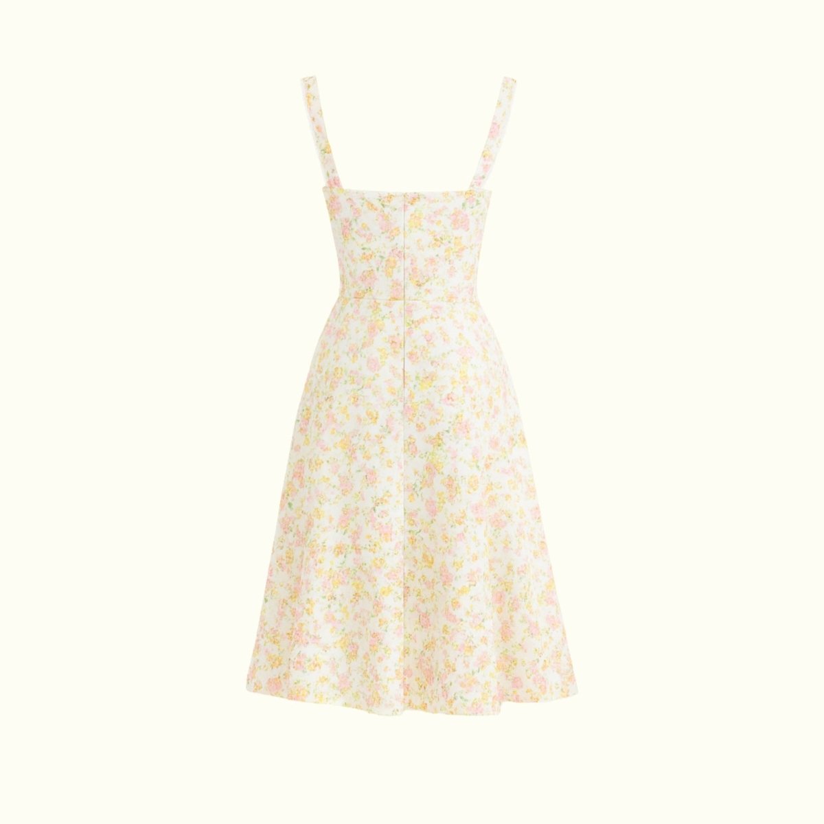 Ivory kouvr Floral dress on a white background