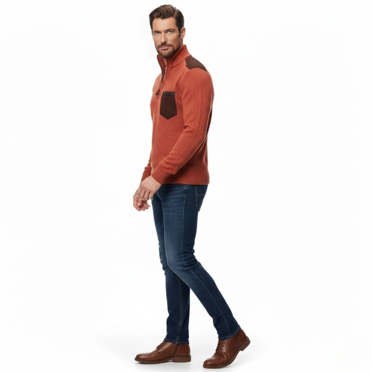 Side profile of a man in a slim fit red orange quarter-zip sweater with brown faux suede shoulder patches.