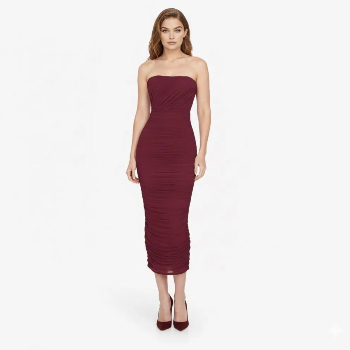 Model wearing the Kouvr Fashion burgundy strapless ruched bodycon midi dress, front view.