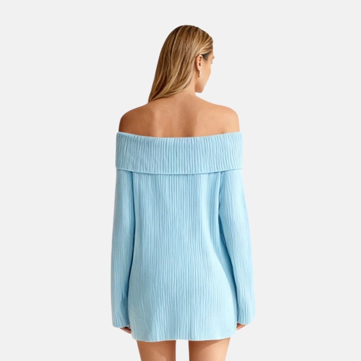 Woman wearing a sky blue off-shoulder dress on a white background