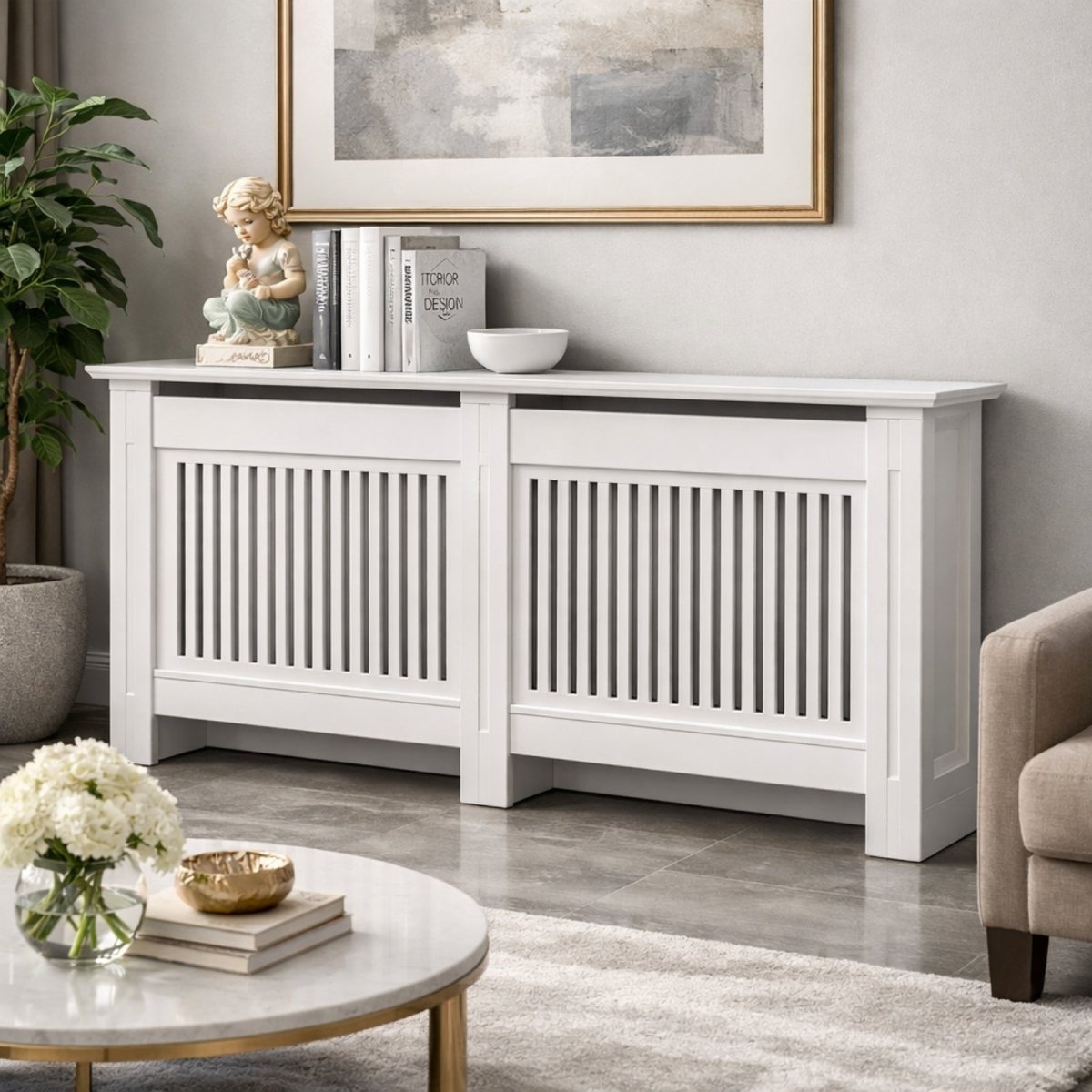 Large white slatted radiator cover by Kouvr styled as a console table in a modern living room with books and a sculpture on top.