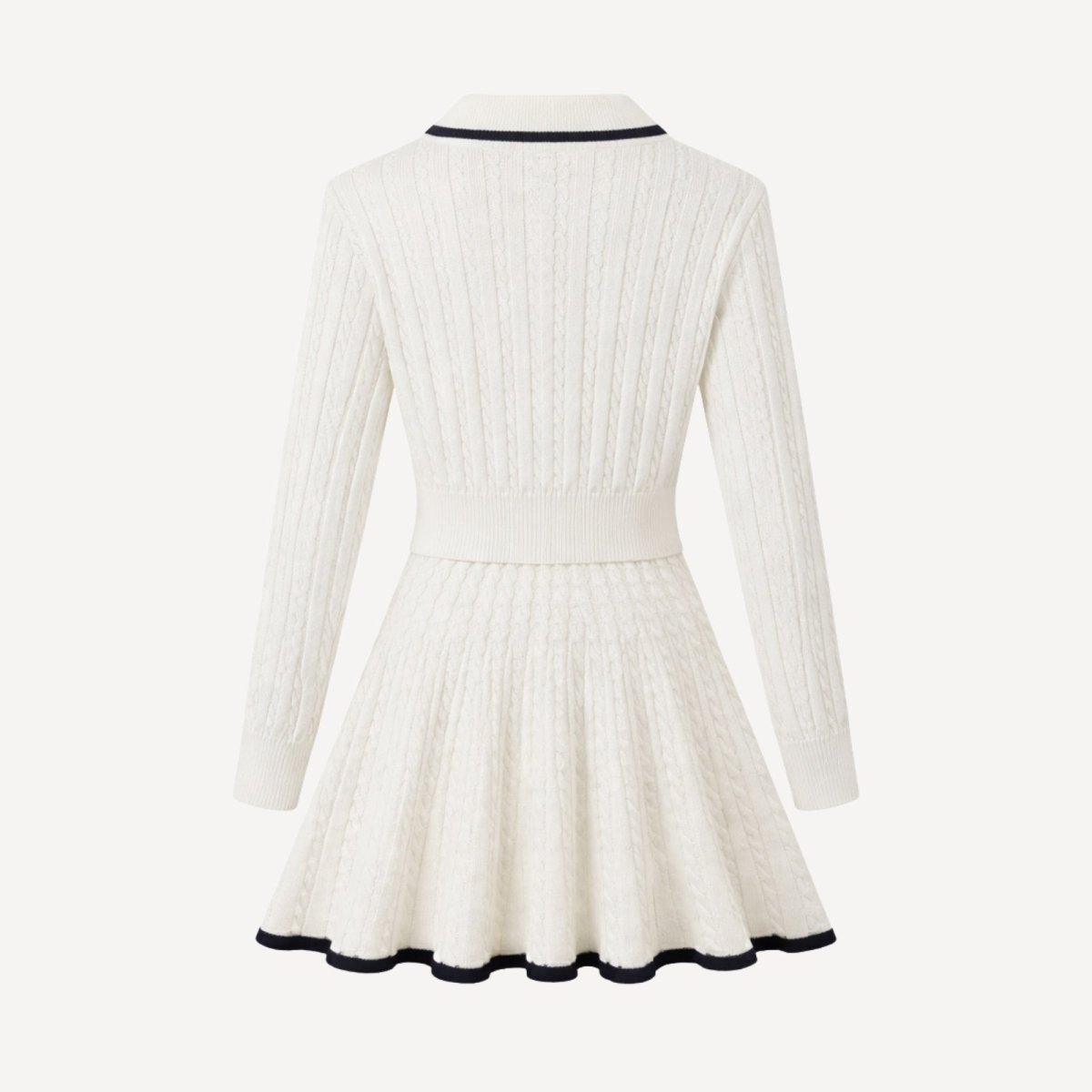 Flat lay showing the back of the Maisy cable knit sweater and skirt set, highlighting the polo collar and knit pattern in detail.