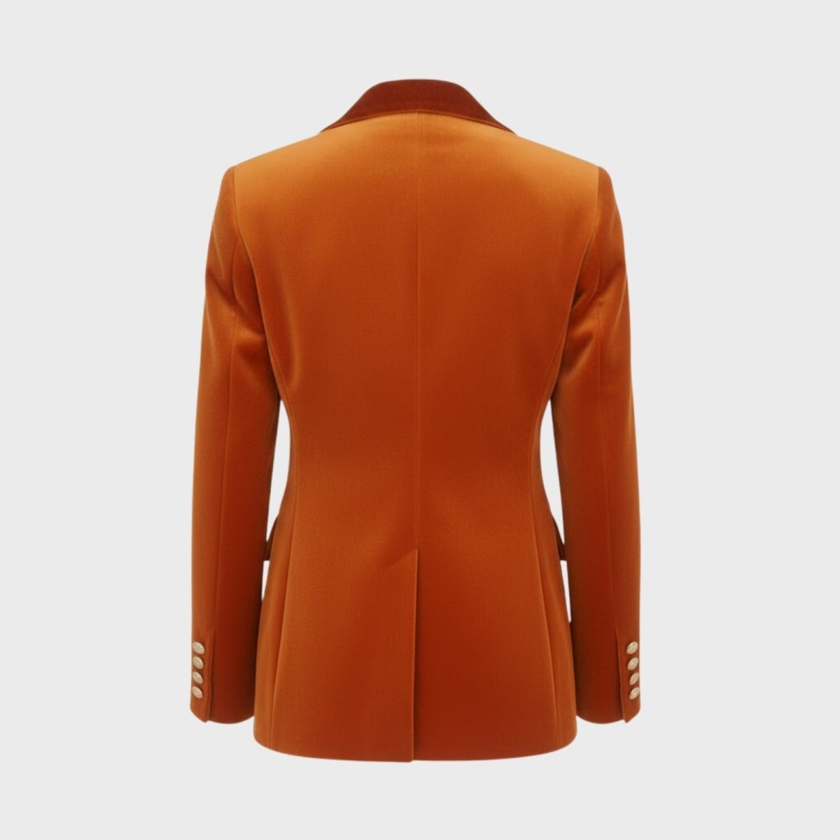Flatlay of the back of the Kouvr Maribel velvet blazer, showing the clean lines and central vent detail.