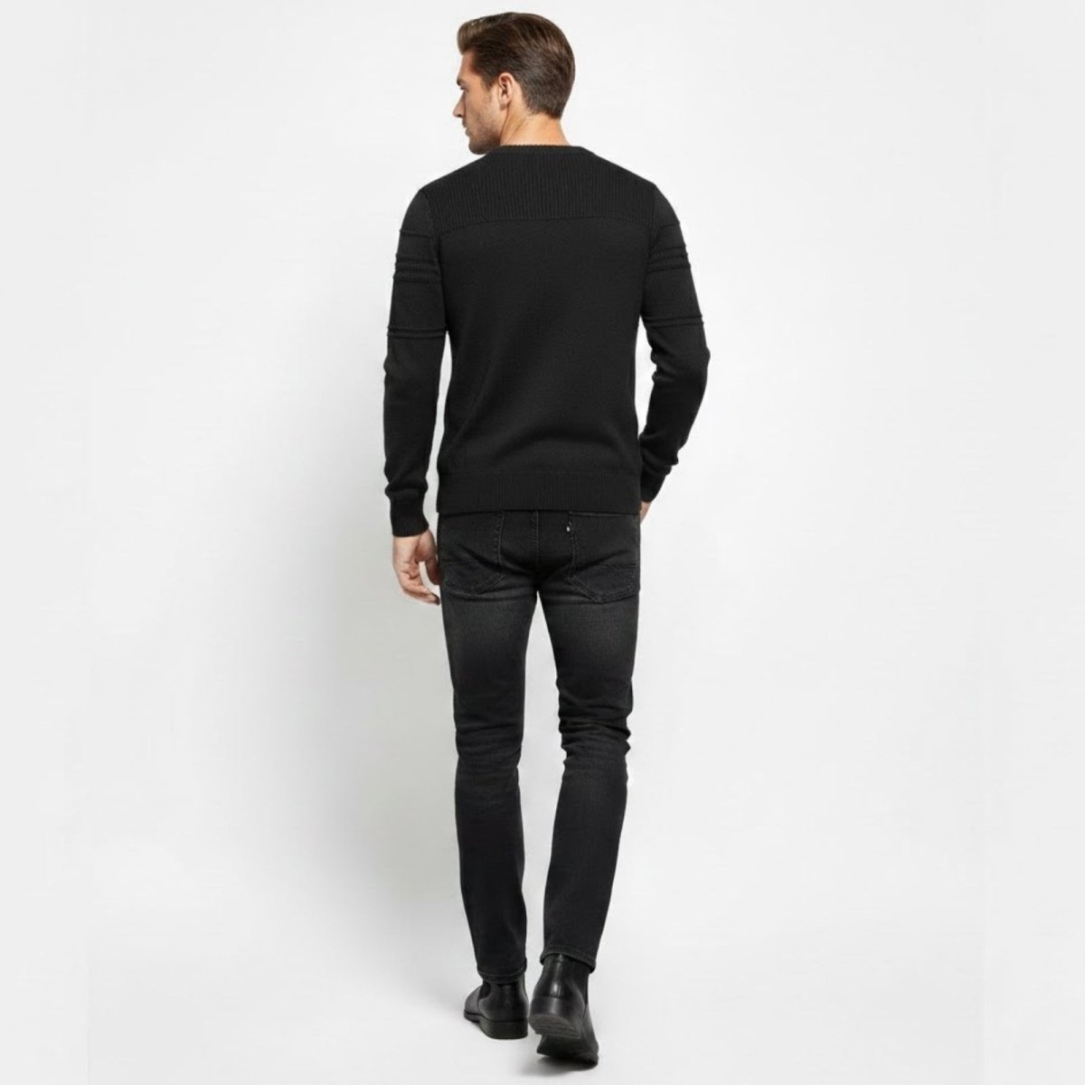 Back view of the Kouvr men's black crewneck sweater highlighting the shoulder and sleeve knit texture.
