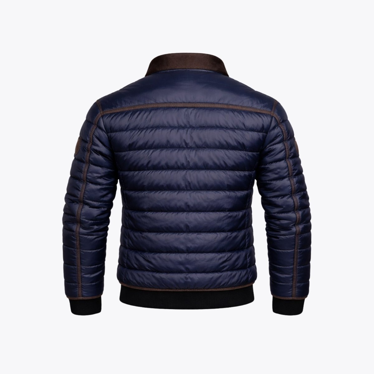 Flat lay back view of the Kouvr men's navy blue quilted outerwear showing horizontal stitching and brown shoulder piping.