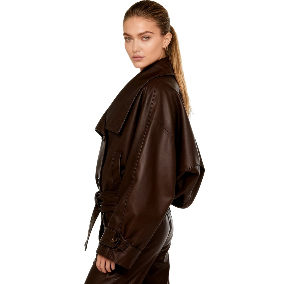 Model wearing Kouvr's Dark Brown cropped faux leather trench jacket with belted waist