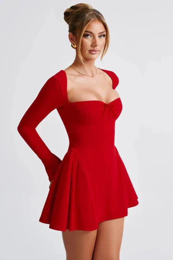 occasionwear," "sculptural dress," "statement piece," "A-line skirt," "cinched waist," and "evening wear