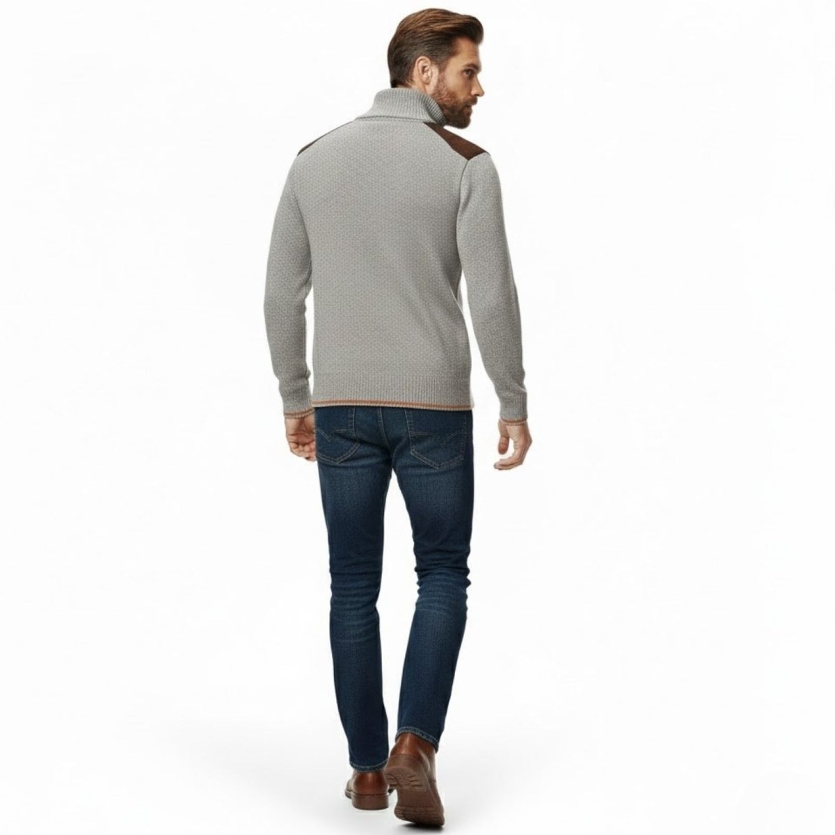 Male model from the back wearing the heather beige Kouvr Soren knit sweater, displaying the fit and suede shoulder patch details.