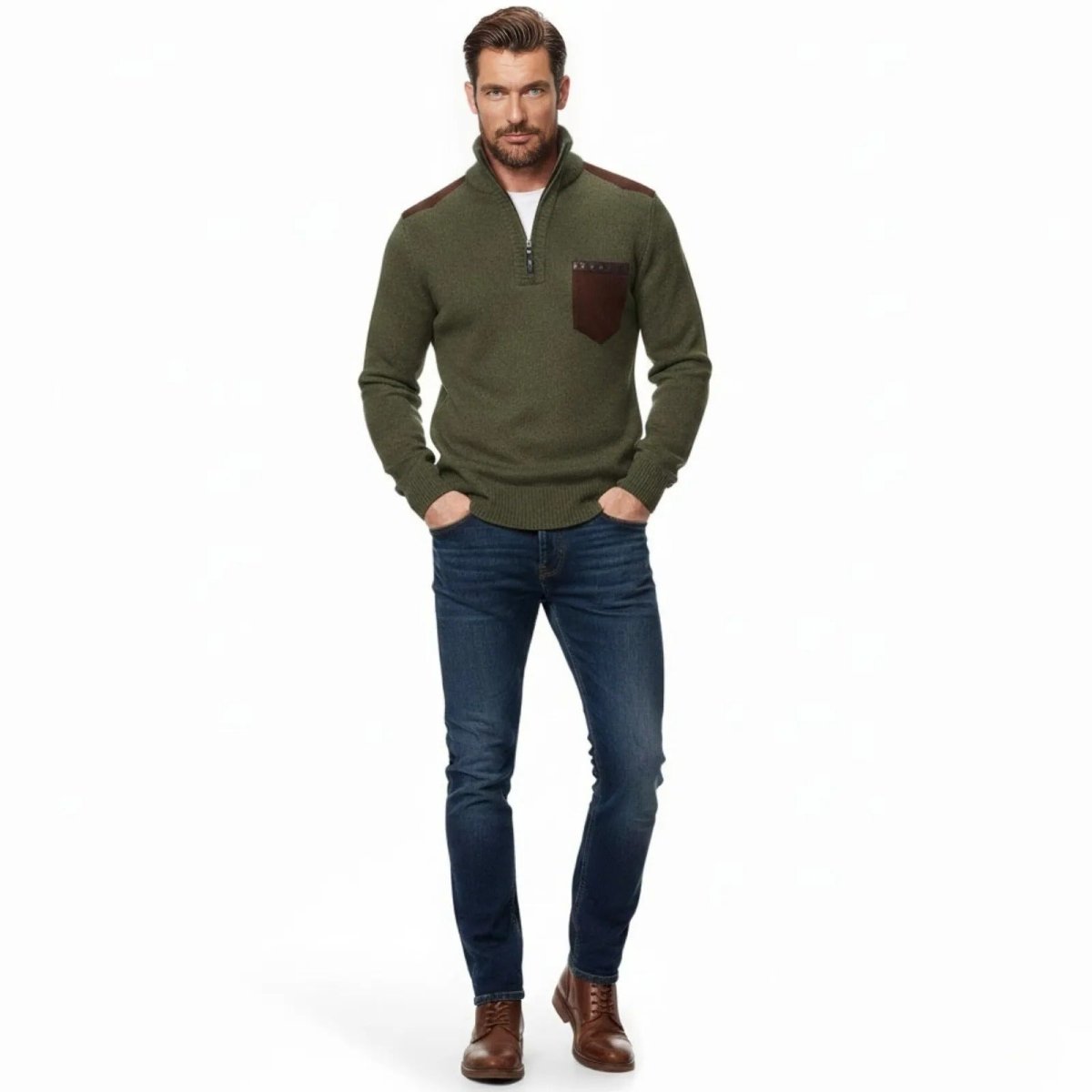 Male model wearing the Kouvr Soren olive green quarter-zip sweater with brown suede patches, paired with dark blue jeans and brown boots.