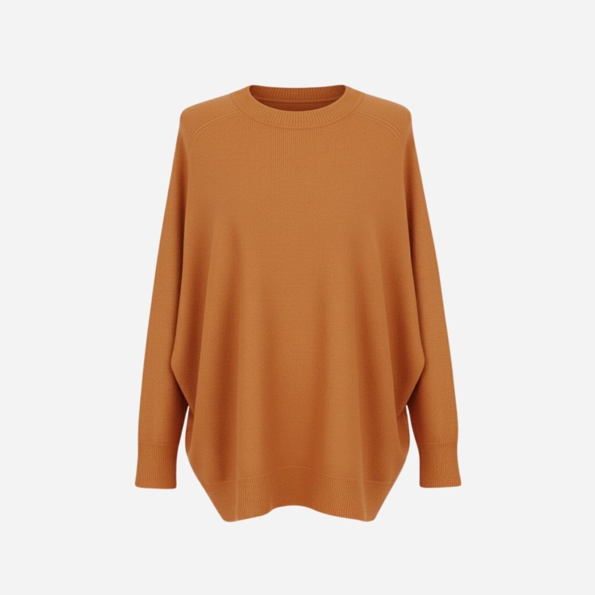 Front flat lay of the Kouvr Tina oversized sweater in terracotta, showing the crew neckline and fine-gauge knit texture.