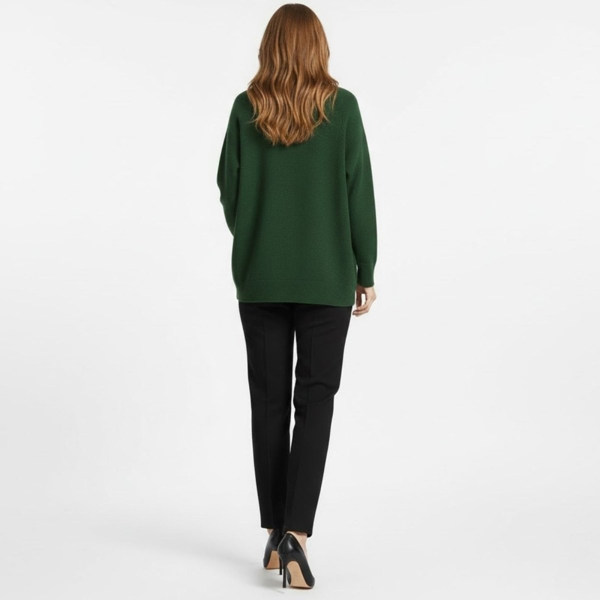 Back view of the Kouvr Fashion Tina Sweater showcasing its tunic length and minimalist design.