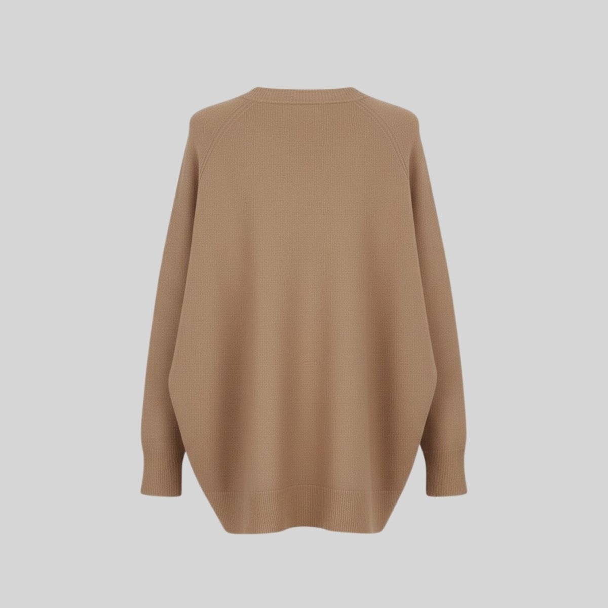 Back flat lay of the Tina oversized cashmere sweater, showing the raglan sleeve seams and overall shape.