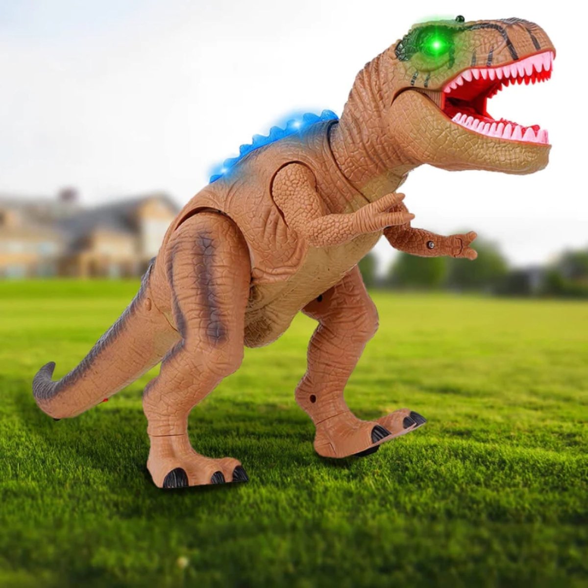 The brown Kouvr remote control dinosaur toy with light-up blue spines and green eyes standing in a grassy yard, demonstrating its walking feature.