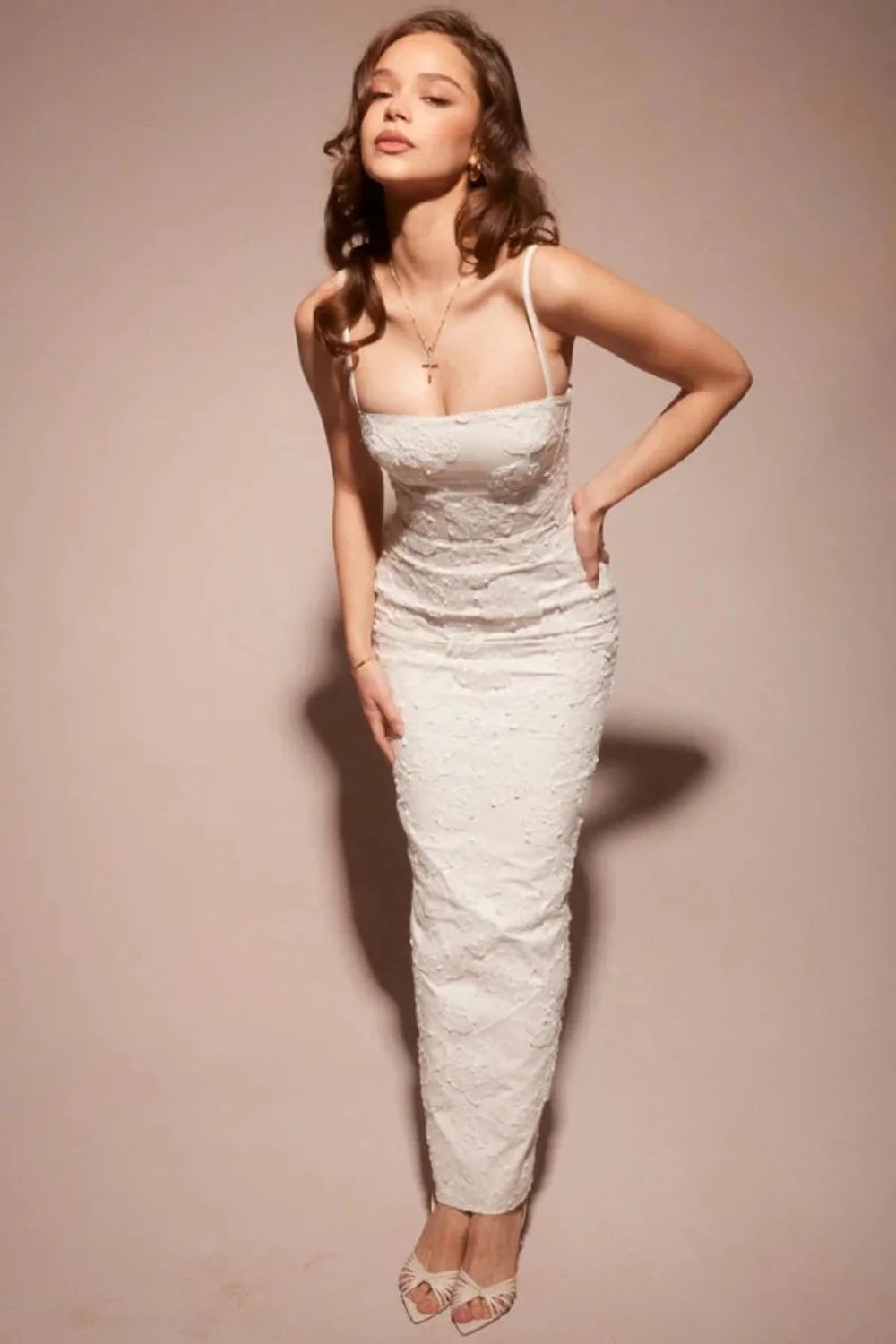 sculptural silhouette," "couture detailing," "ethereal elegance," "minimalist bride," "civil ceremony attire," and "rehearsal dinner outfit