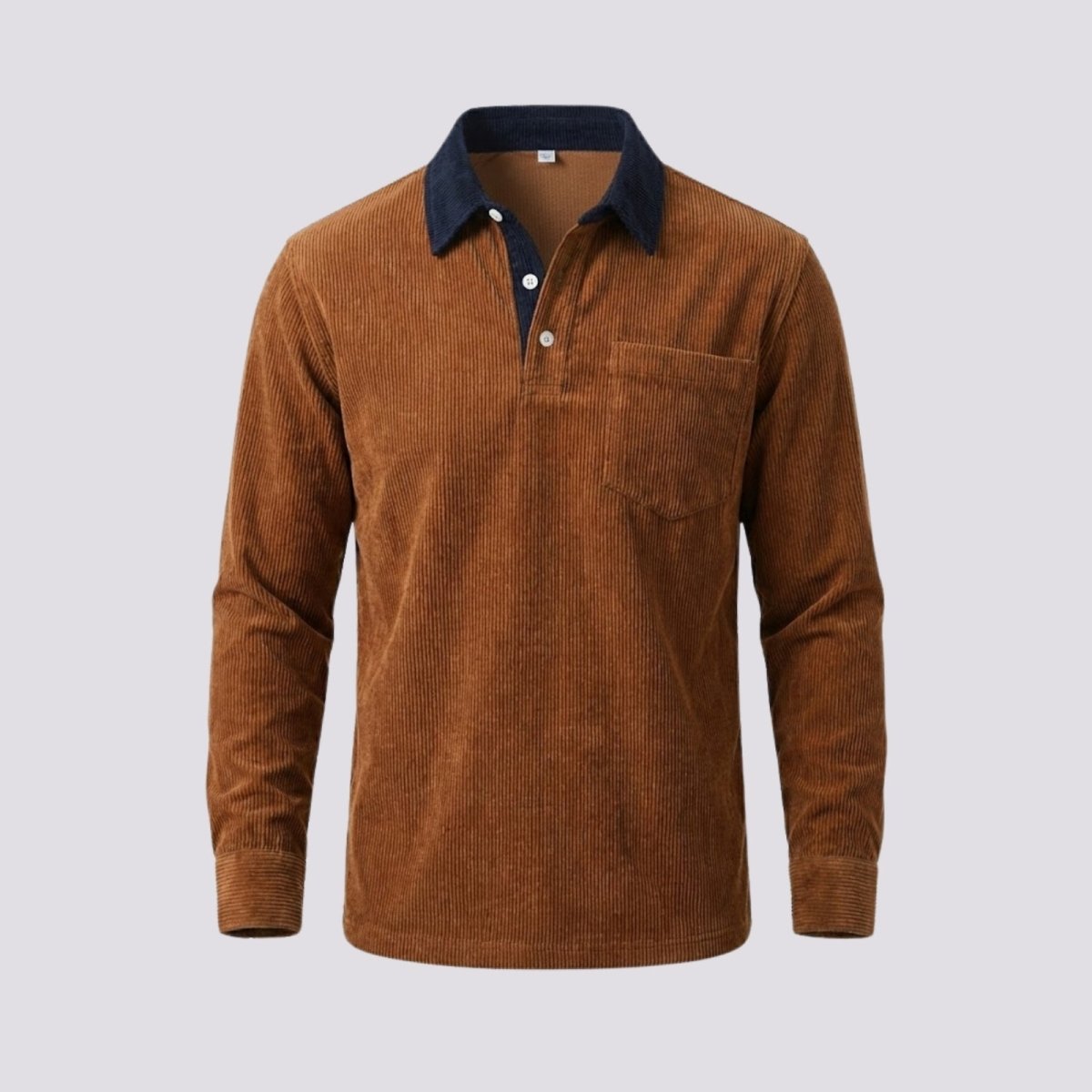 Front product shot of the Zain corduroy polo in orange, highlighting the fine-wale texture, chest pocket, and button placket.