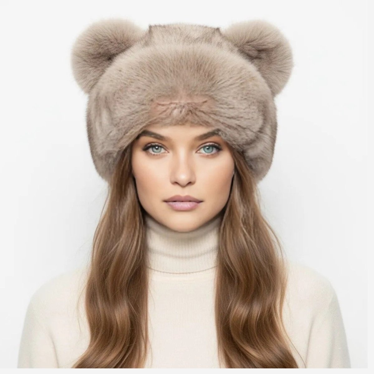 A model with blue eyes wearing the Kouvr beige pastel mink fur bear ear hat, showcasing luxury winter fashion.