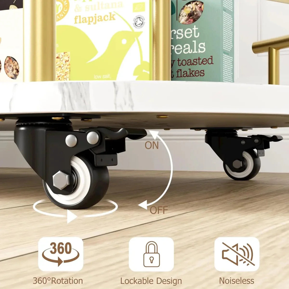 Close up of black and silver noiseless caster wheels on a marble bar cart with a lock/brake mechanism engaged.