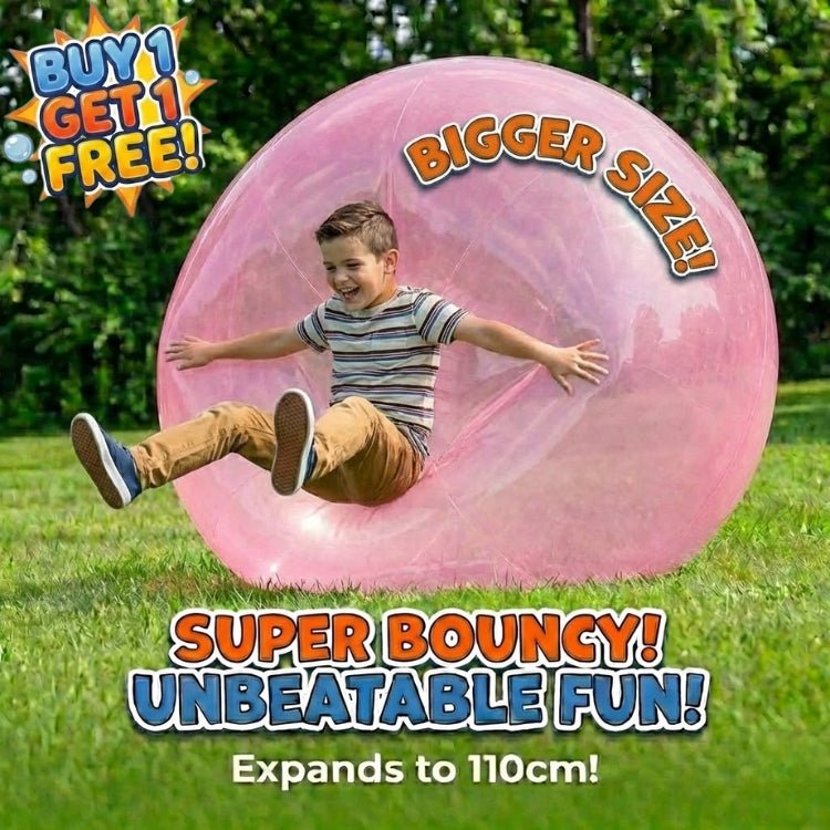 A child playing with a giant pink jelly balloon ball in a park, demonstrating the bigger 110cm size and unbreakable fun factor.