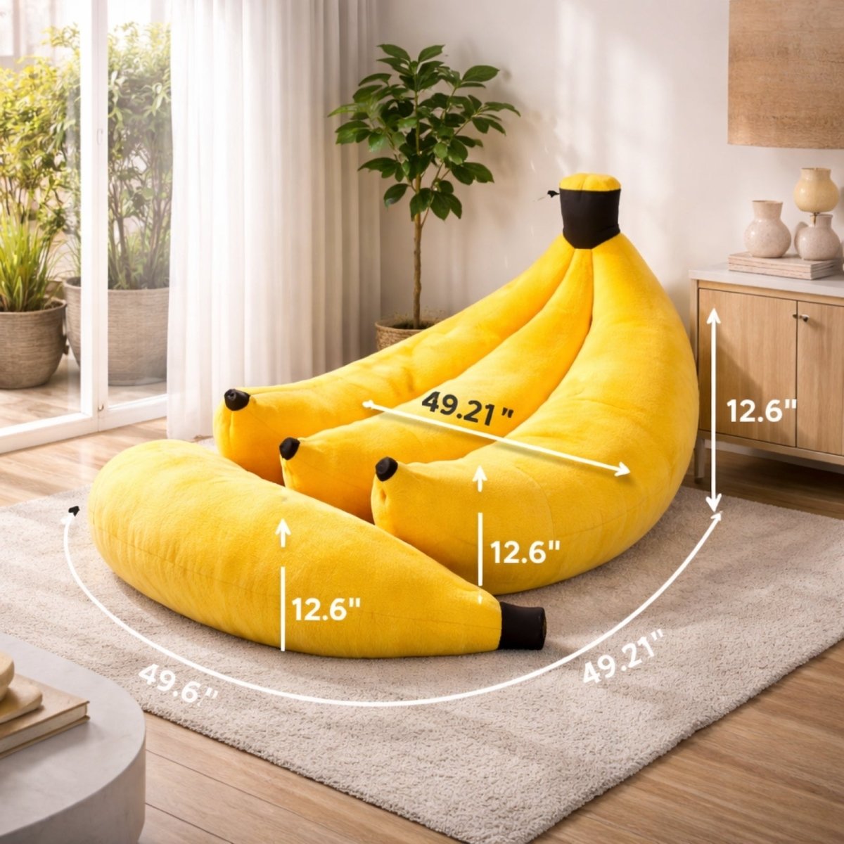 Size specification overlay on yellow banana chair showing nearly 50-inch length to accommodate full body lounging.