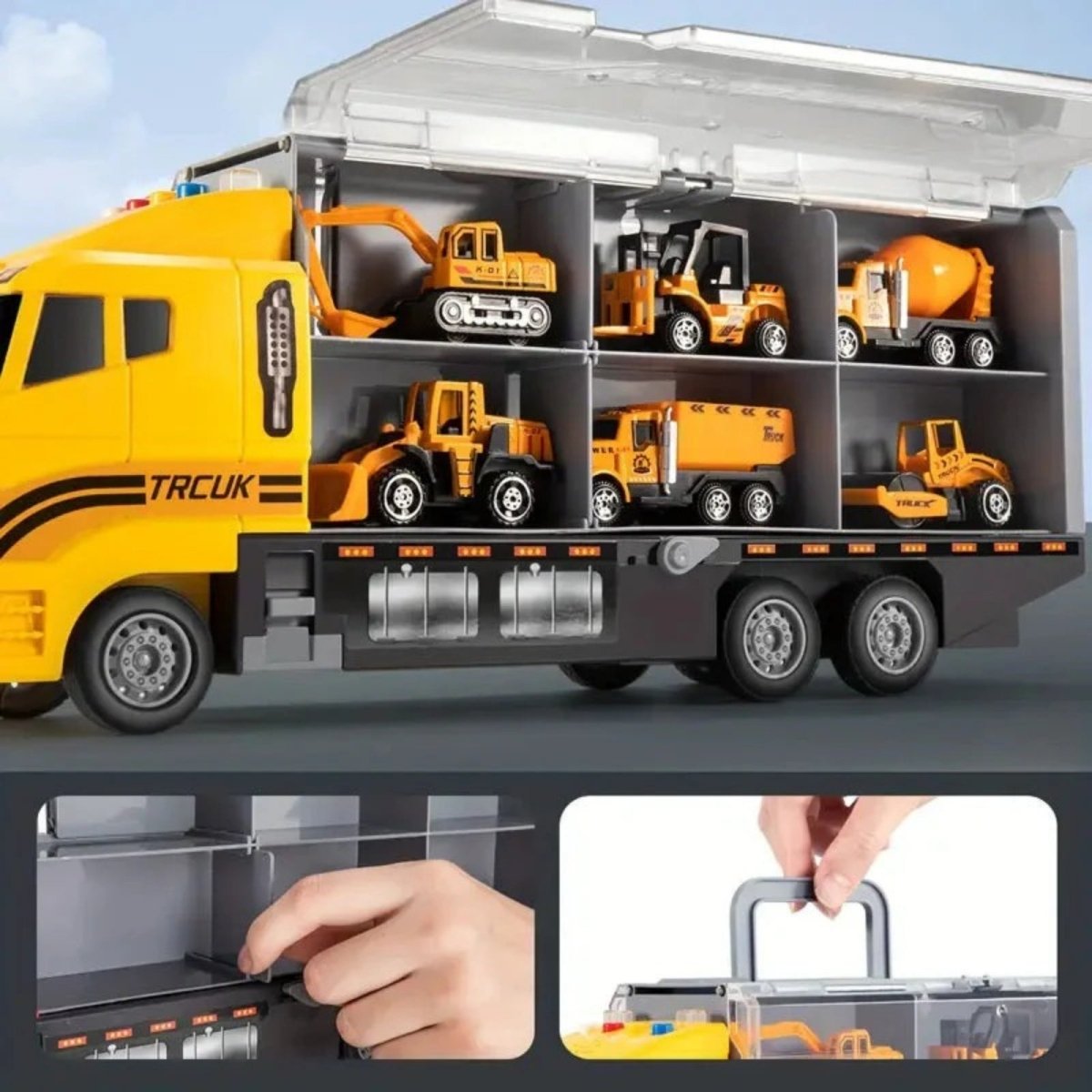 Close-up view of a small cement mixer toy exiting the front of the yellow Kouvr hauler truck via a fold-down ramp feature.
