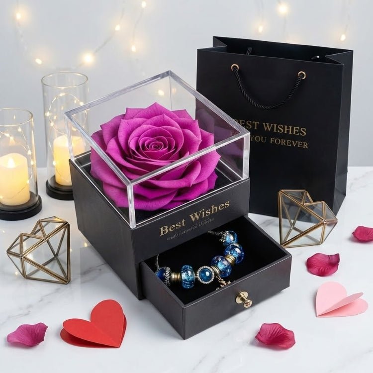 A vibrant deep purple preserved rose centerpiece in a clear-top jewelry box, perfect for a unique Valentine's gift.