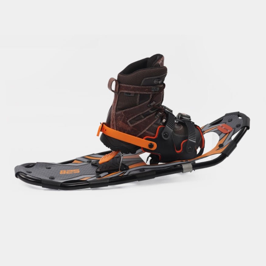 Sideview of a  snowshoe showcasing aggressive steel crampons for ice and hard-packed snow.