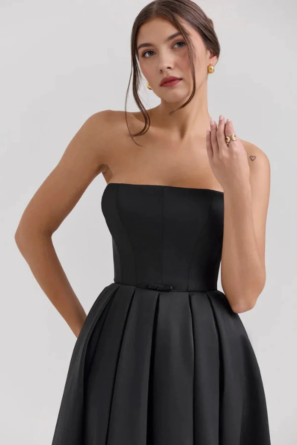 timeless silhouette, structured bodice, old hollywood glamour, sophisticated evening wear, and investment piece
