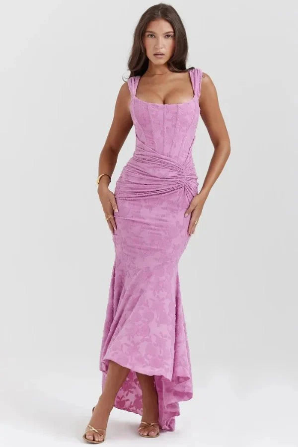 Model wearing Kouvr Arabella pink floral jacquard corset mermaid gown
