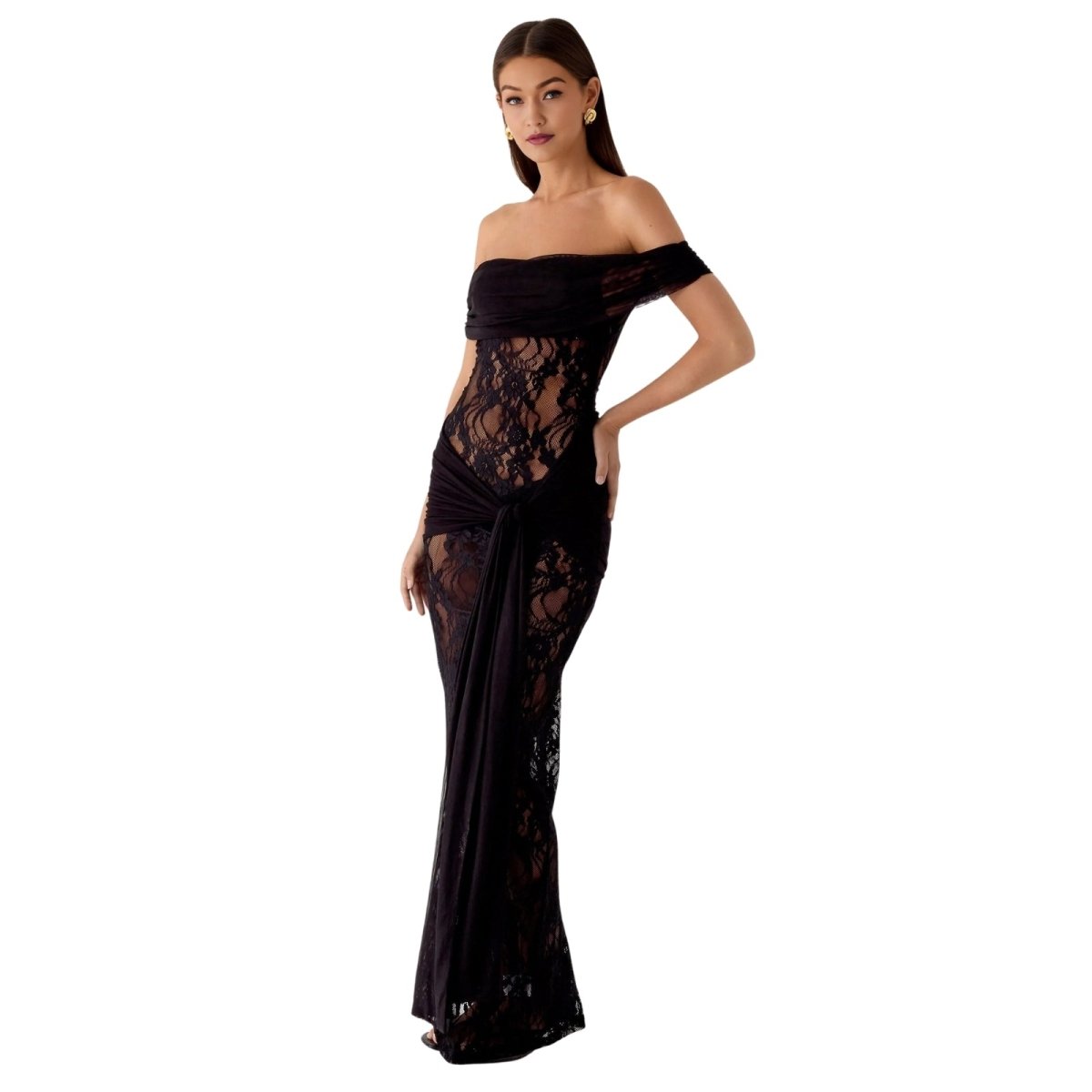 Woman wearing a black Kouvr off-shoulder lace dress on a white background