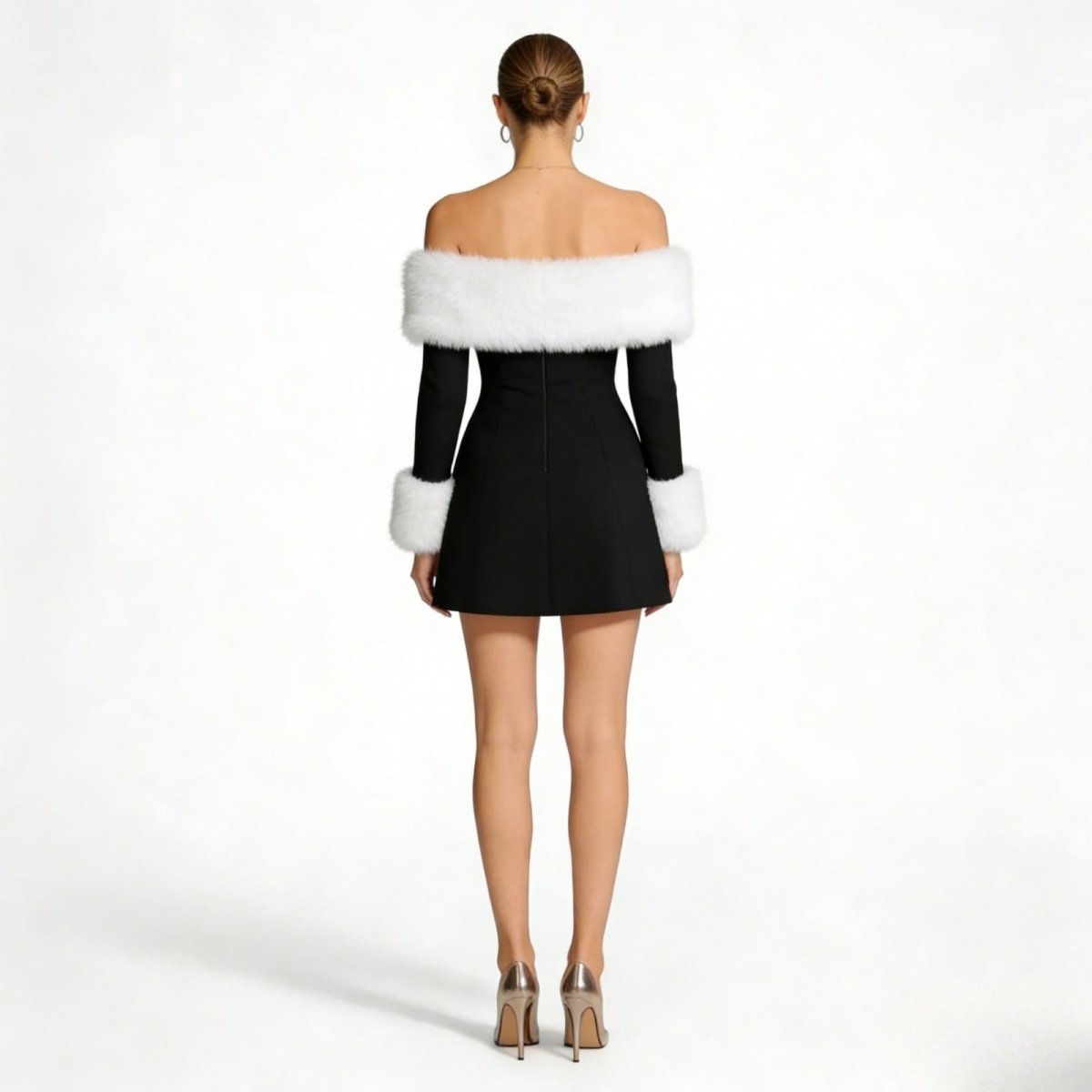 Back view of the off-the-shoulder Bardot neckline on a black mini party dress with white faux fur trim by Kouvr Fashion.